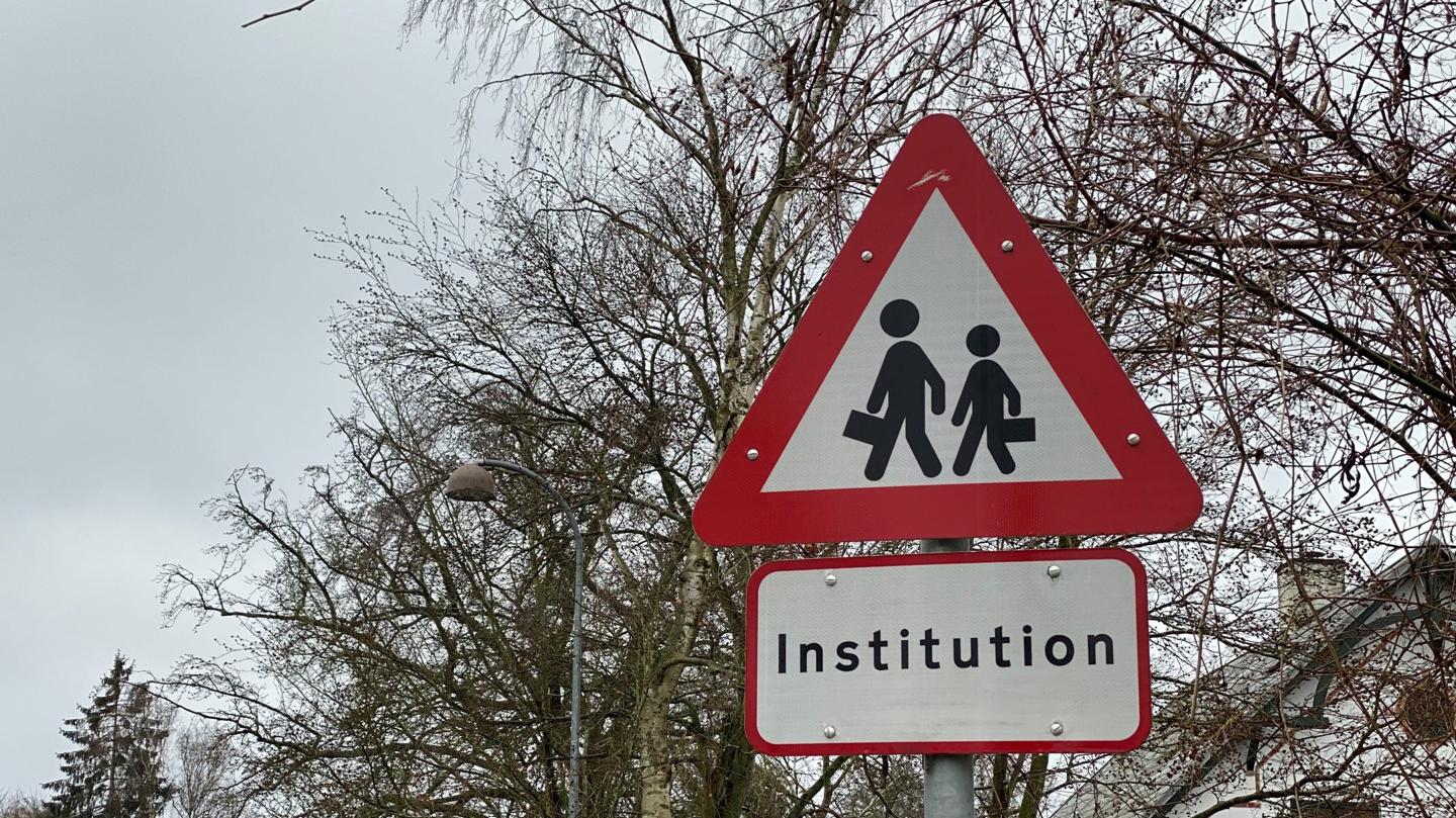 Illustration skilt med institution